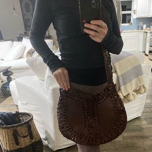 Brown leather purse. Bohemian style